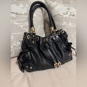 Michael Kors studded bucket drawstring bag